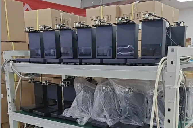 A rack of finished Vision MCD-900-1 detectors awaiting testing and packing